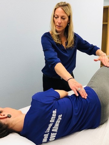 Image of pregnant woman holding her stomach Pregnant Woman Image